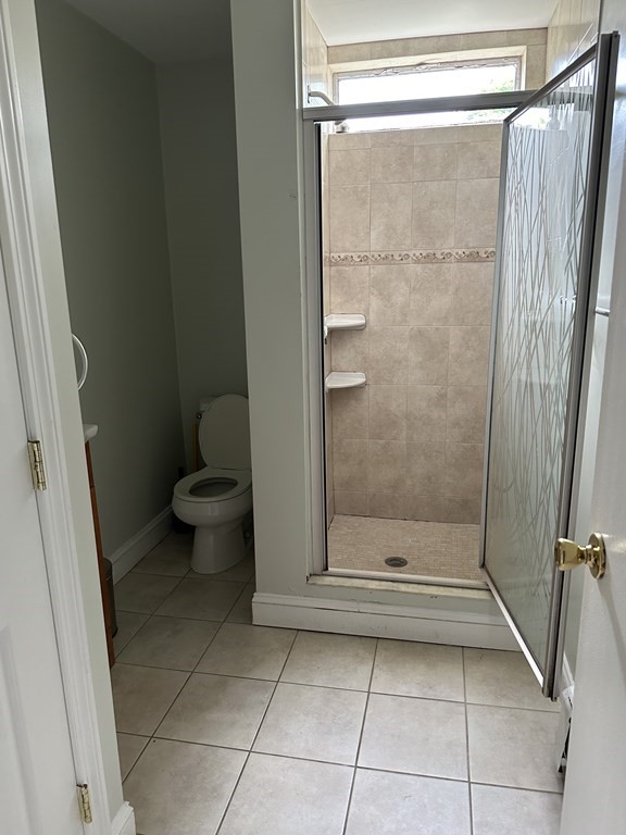 37 Selwyn Road Newton, MA 02461 - Photo 7 of 9 a bathroom with a shower and a toilet