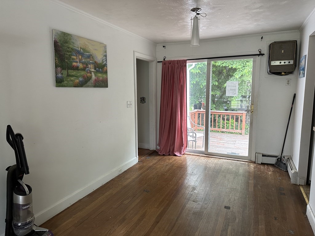 37 Selwyn Road Newton, MA 02461 - Photo 9 of 9 a view of a room with a large window and wooden floor