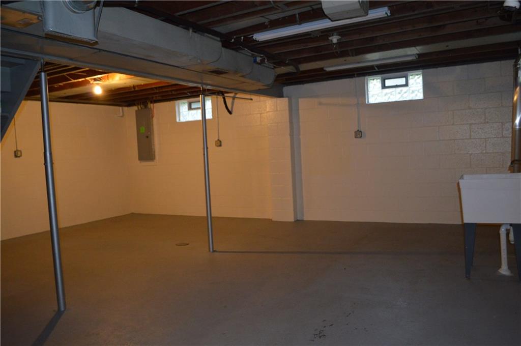 557 Shenango Road Beaver Falls, PA 15010 - Photo 15 of 25 Clean as a whistle. The 10 1/2 block basement measures 23 x 35. It's an open canvas for you. Block windows, 200 amp electric, laundry/utility tub.