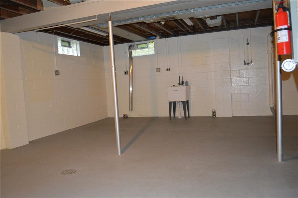 557 Shenango Road Beaver Falls, PA 15010 - Photo 16 of 25 There's plenty of natural light in the neat, clean, open basement! Dryer vent in place near utility tub. Pilasters on side and rear walls. A well built home.