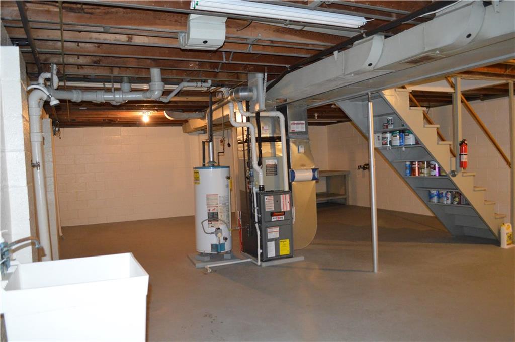 557 Shenango Road Beaver Falls, PA 15010 - Photo 17 of 25 Another view of the large, open basement. Note the placement of the newer furnace and water heater in the center of the room.....It makes it easy to finish off a few rooms!