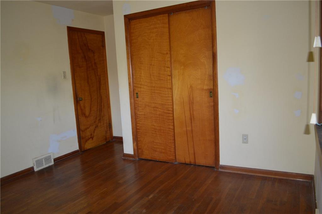 557 Shenango Road Beaver Falls, PA 15010 - Photo 25 of 25 Generous closet space in the Master Bedroom. Notice the rich wood grains.
