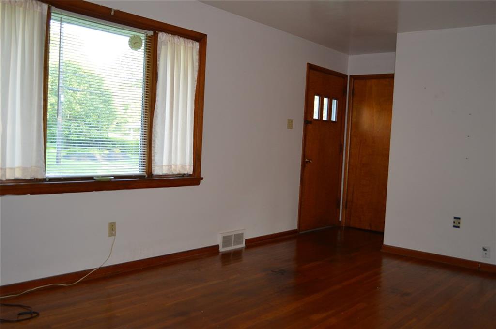 The front entry welcomes you to a warm and inviting home.   The coat closet is conveniently located just inside.  A second closet (unseen) offers additional storage and easy access to the full insulated attic!