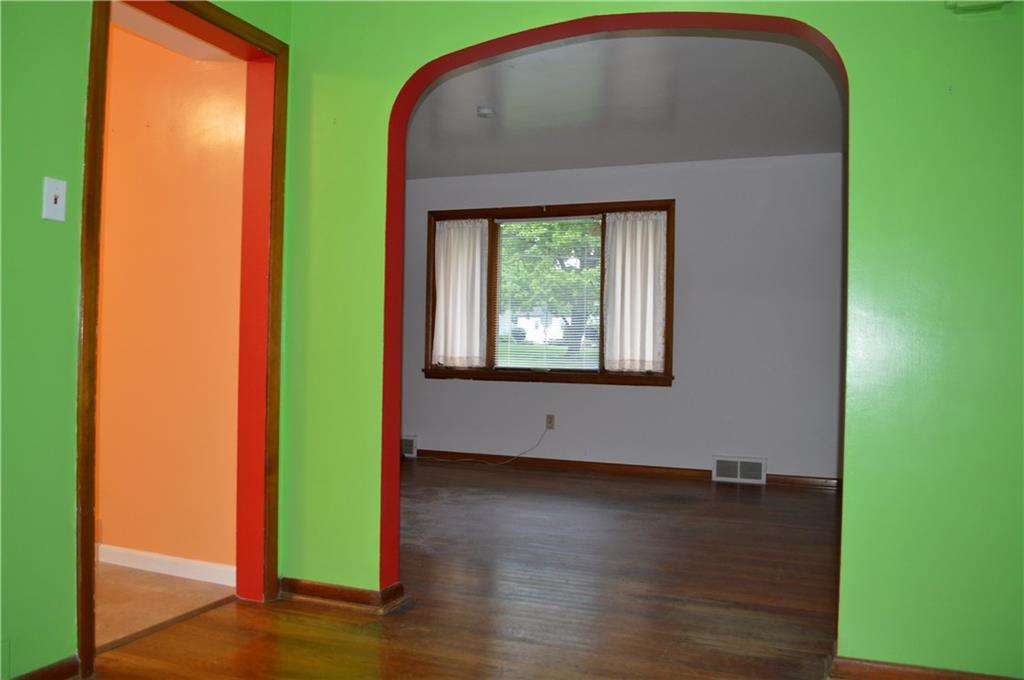 557 Shenango Road Beaver Falls, PA 15010 - Photo 9 of 25 Happy colors can easily be neutralized to make the hardwood floors and trim POP with style!