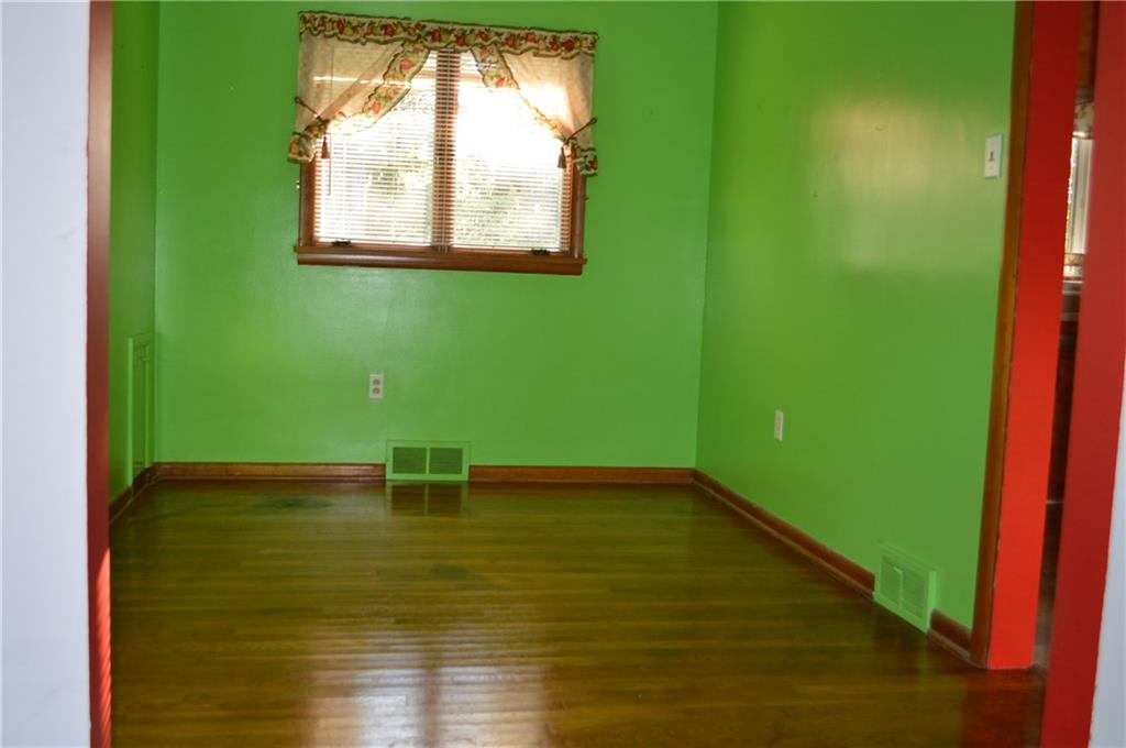 557 Shenango Road Beaver Falls, PA 15010 - Photo 10 of 25 The dining room features hardwood flooring ready for your shine! Sturdy plaster walls!