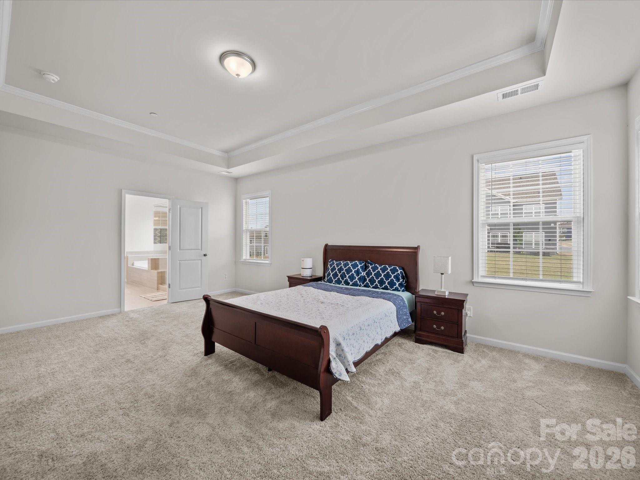 9582 Creighton Road Northwest Concord, NC 28027 - Photo 19 of 43 a bedroom with a bed and a window