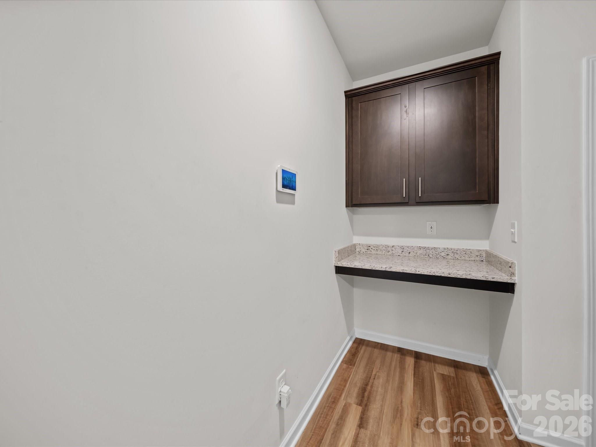 9582 Creighton Road Northwest Concord, NC 28027 - Photo 26 of 43 a view of livingroom with wooden floor
