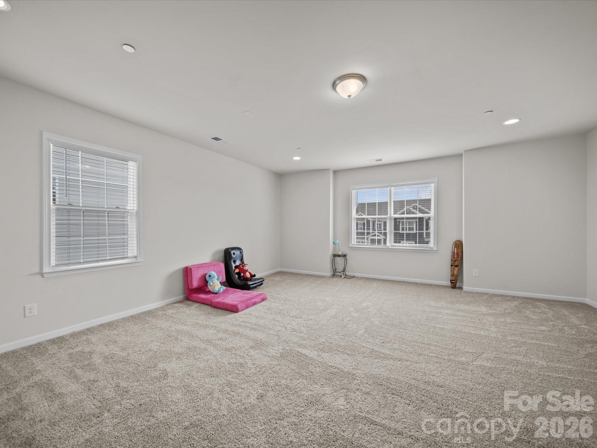9582 Creighton Road Northwest Concord, NC 28027 - Photo 28 of 43 a big room with windows