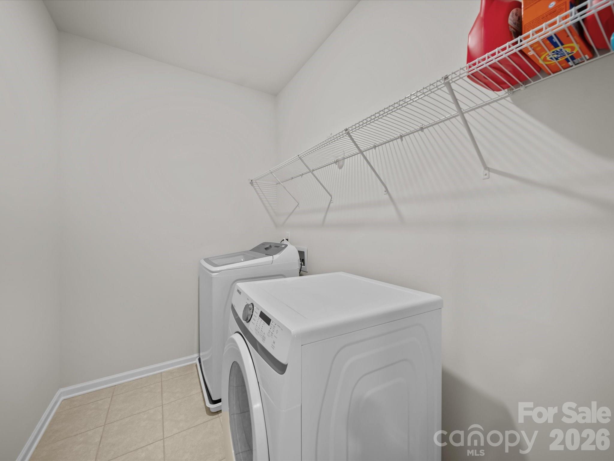9582 Creighton Road Northwest Concord, NC 28027 - Photo 31 of 43 a utility room with dryer and washer
