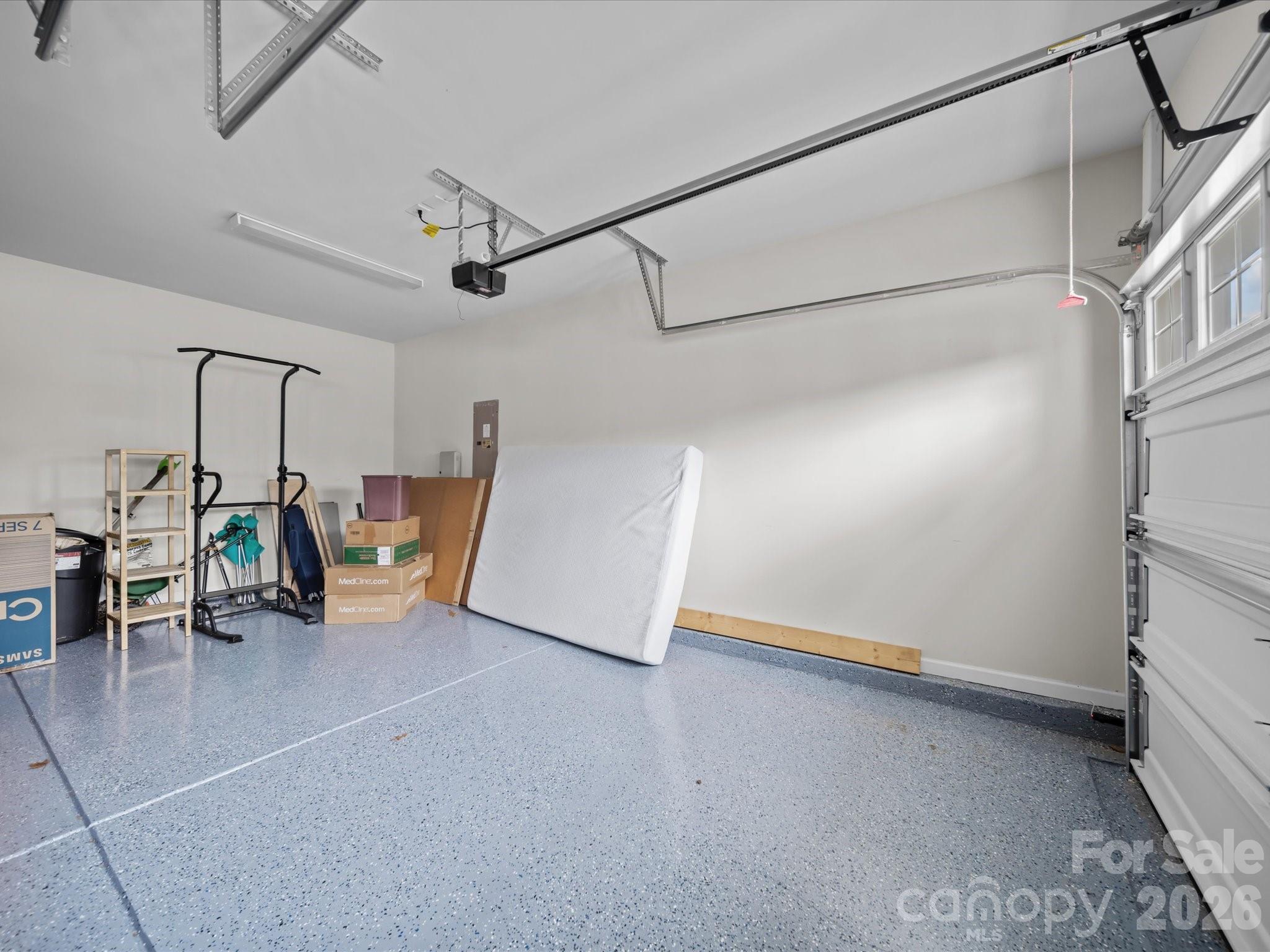 9582 Creighton Road Northwest Concord, NC 28027 - Photo 32 of 43 a view of a livingroom with furniture and a ceiling fan