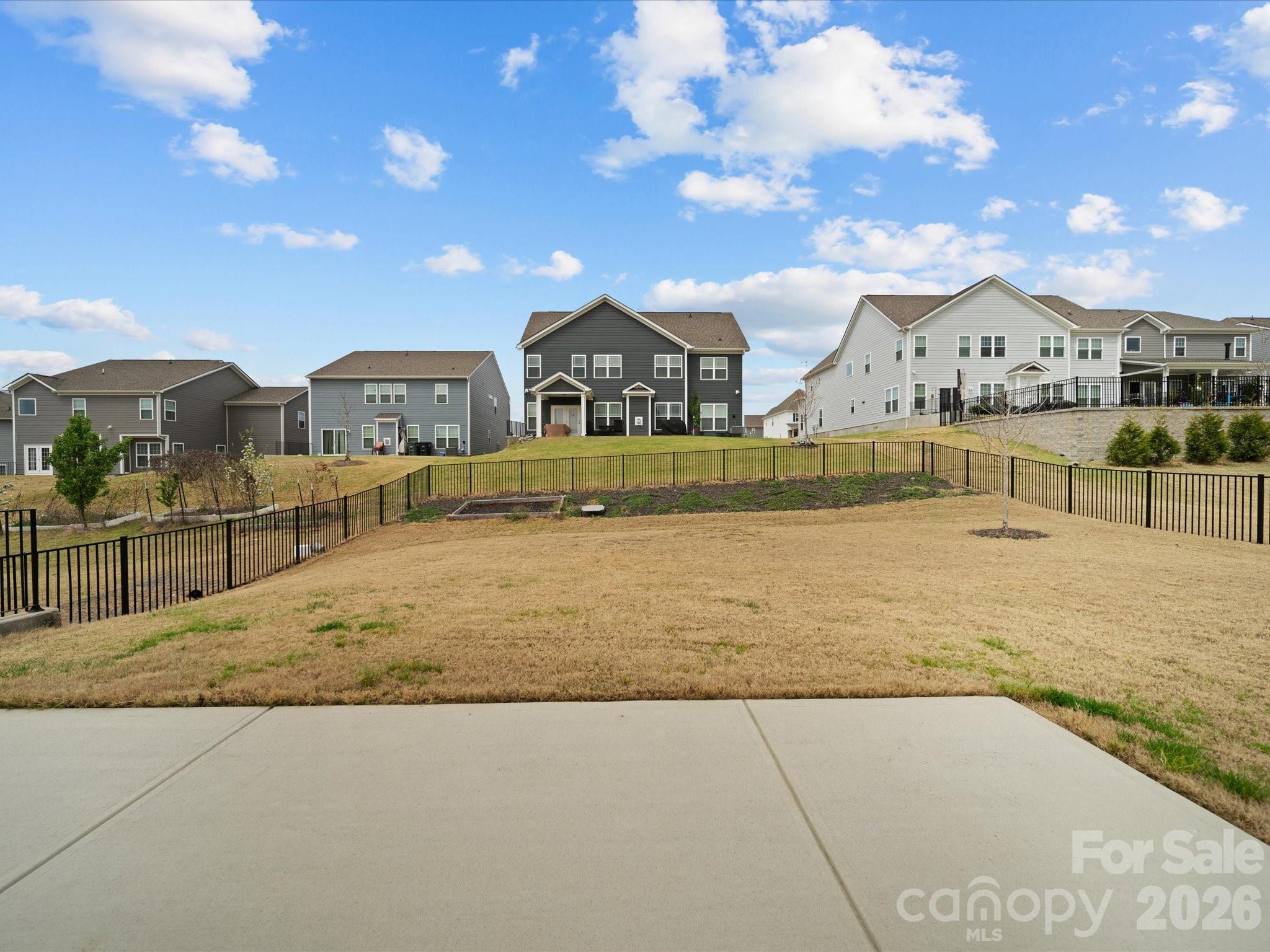 9582 Creighton Road Northwest Concord, NC 28027 - Photo 33 of 43 a view of a house with a swimming pool