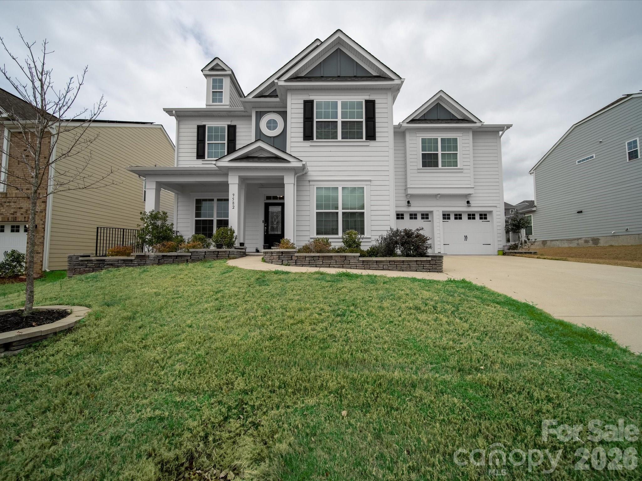 9582 Creighton Road Northwest Concord, NC 28027 - Photo 36 of 43 a front view of a house with a yard