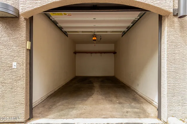 a front view of a house with a garage