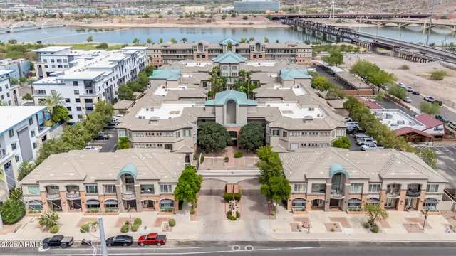 an aerial view of a house with outdoor space