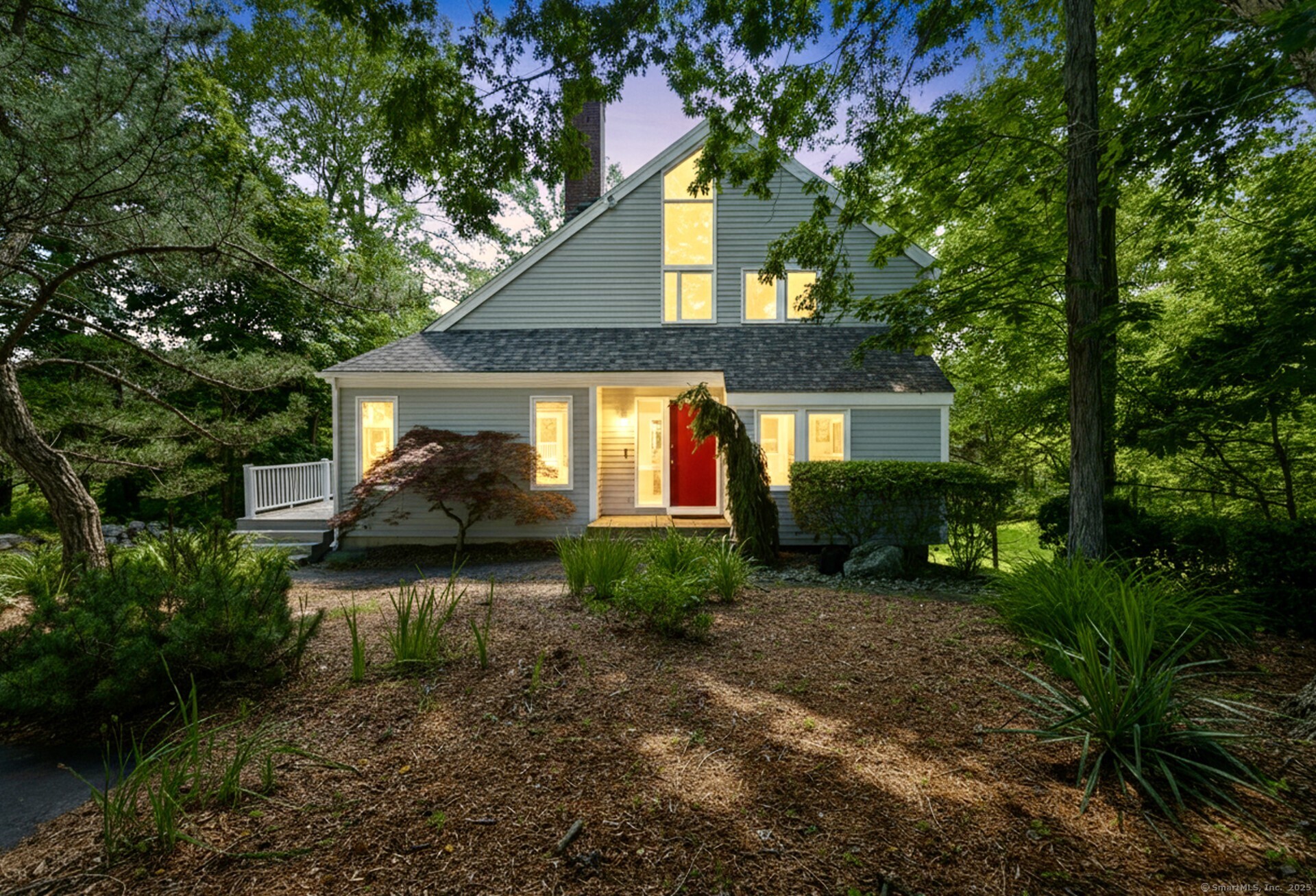 11 Island Bay Circle Guilford, CT 06437 - Photo 1 of 1 a front view of a house with garden