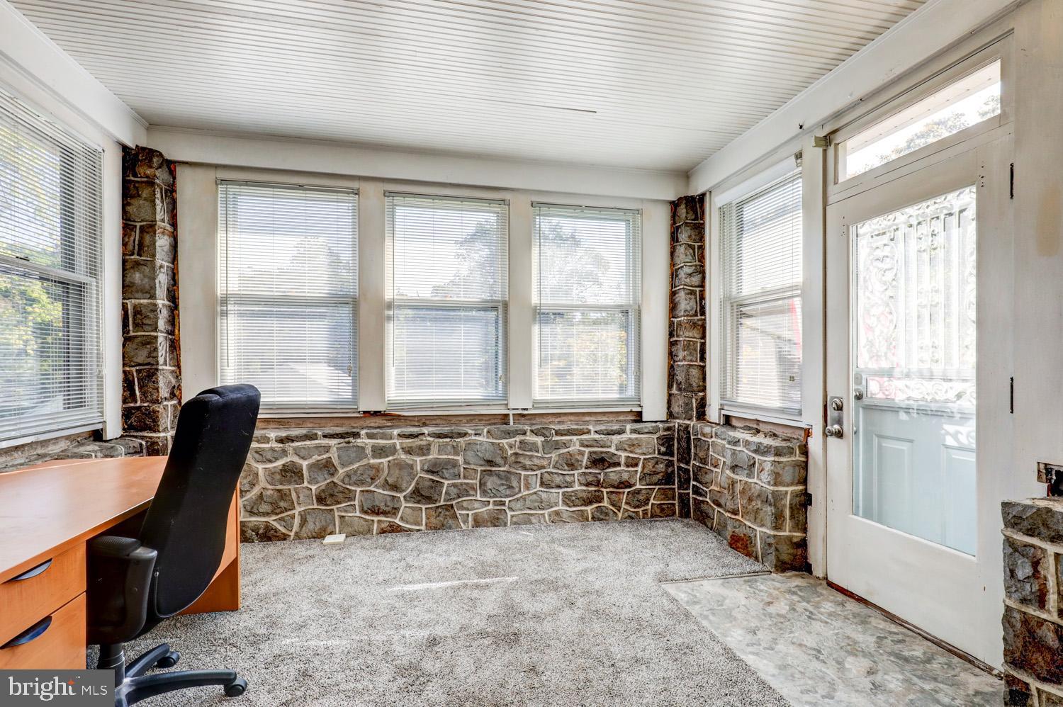 483 Angora Road Reading, PA 19606 - Photo 25 of 73 a view of a workspace with furniture and a window