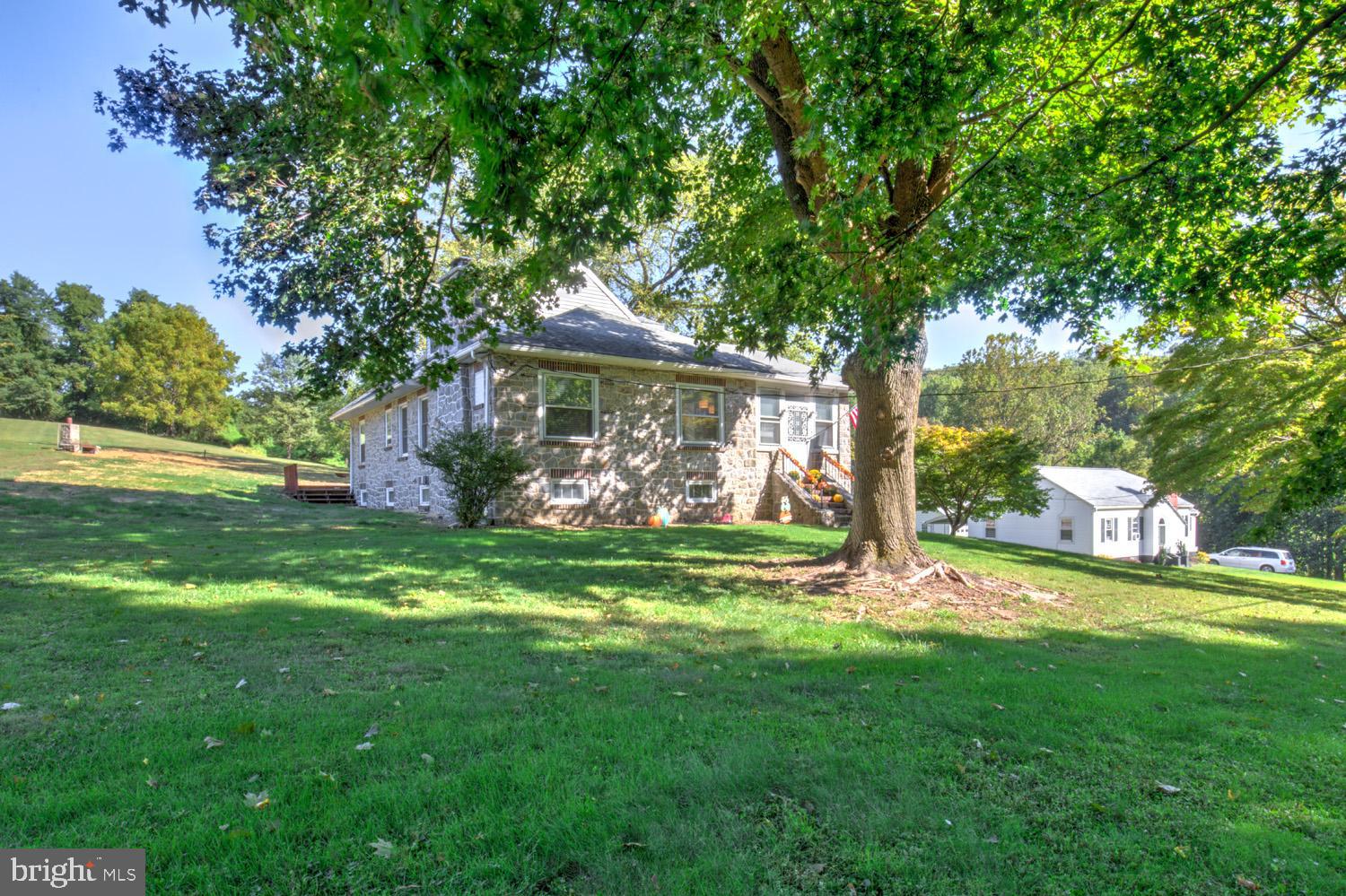 483 Angora Road Reading, PA 19606 - Photo 3 of 73 a view of a house with a yard