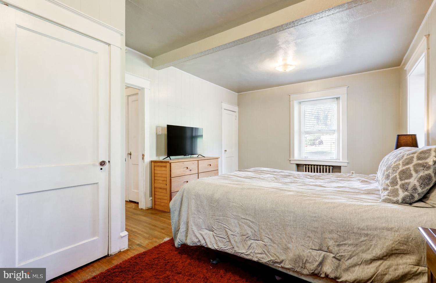 483 Angora Road Reading, PA 19606 - Photo 34 of 73 a bedroom with a bed and a flat screen tv