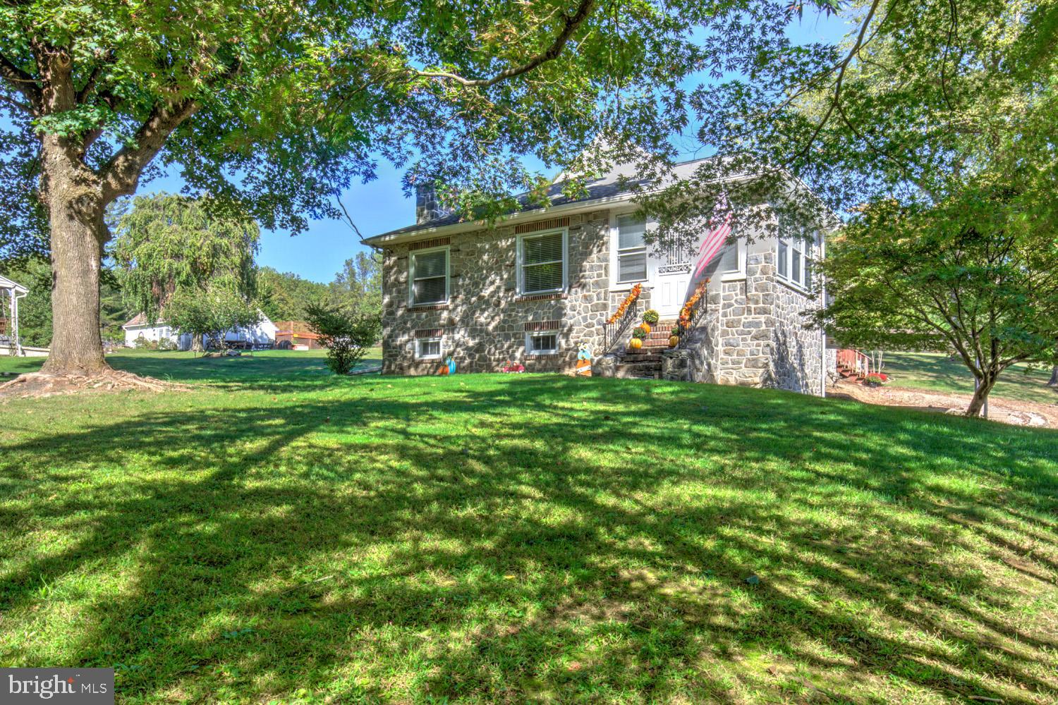483 Angora Road Reading, PA 19606 - Photo 4 of 73 a view of a house with yard and tree s