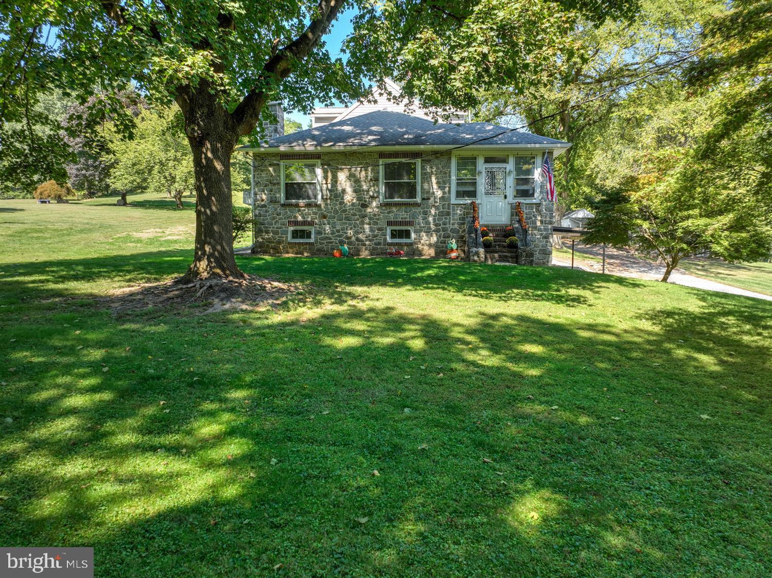 483 Angora Road Reading, PA 19606 - Photo 44 of 73 a view of a house with a yard