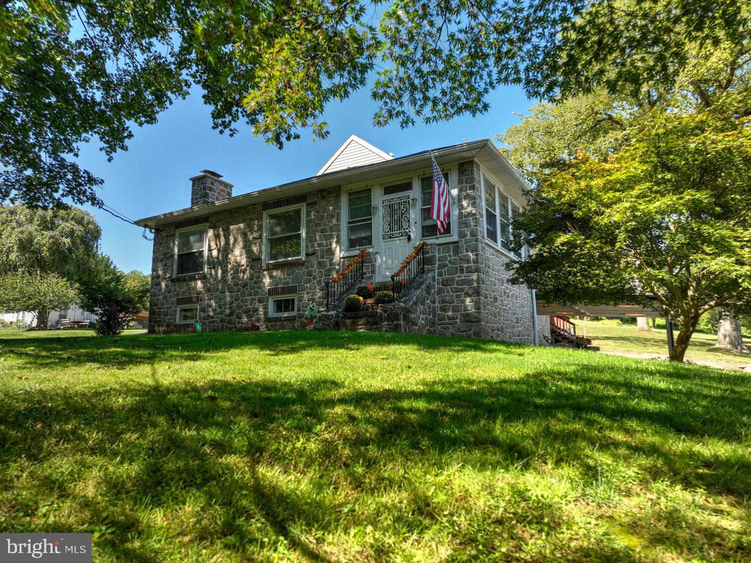 483 Angora Road Reading, PA 19606 - Photo 47 of 73 a front view of a house with a garden