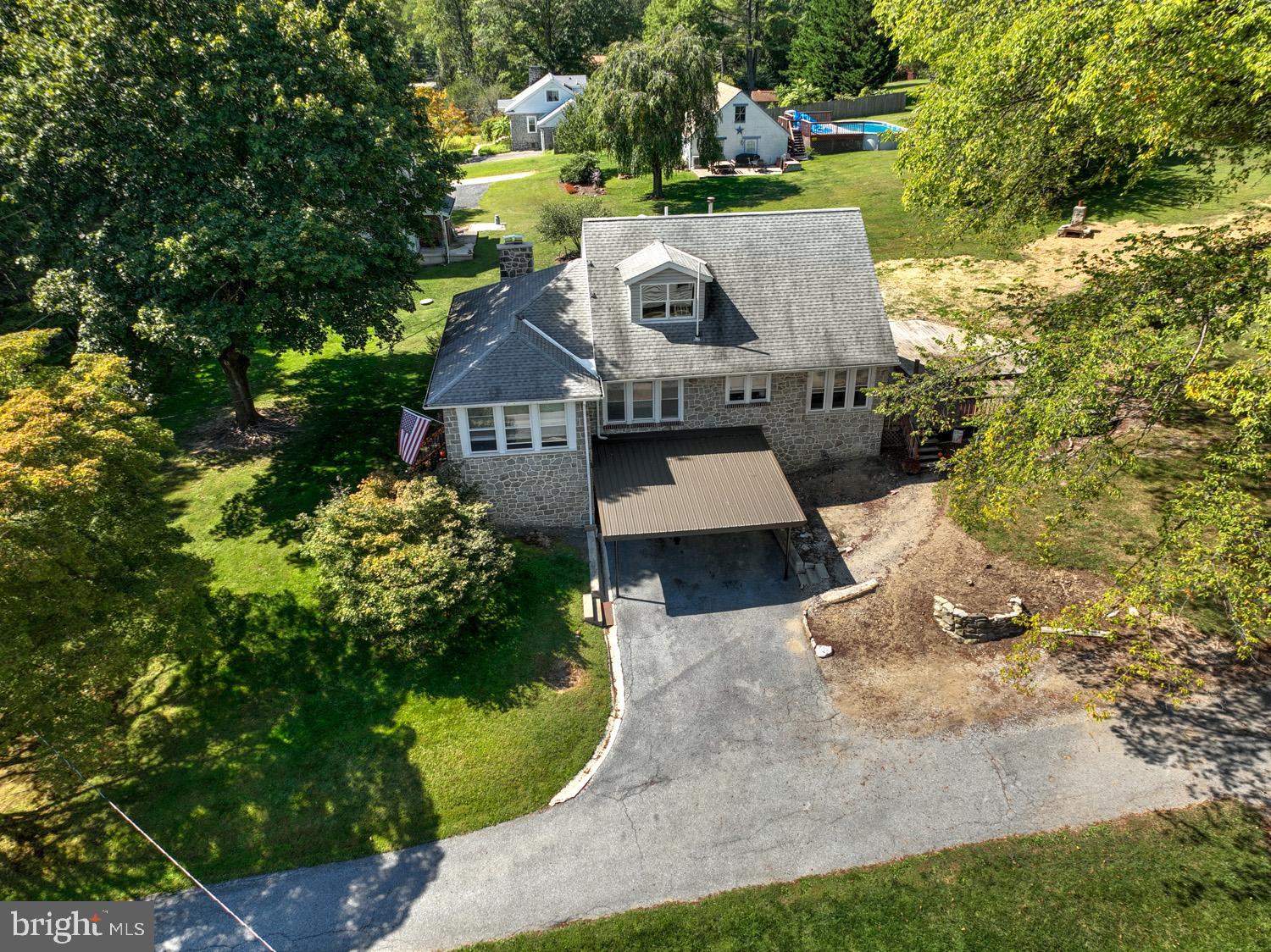 483 Angora Road Reading, PA 19606 - Photo 50 of 73 an aerial view of a house with a yard and large trees