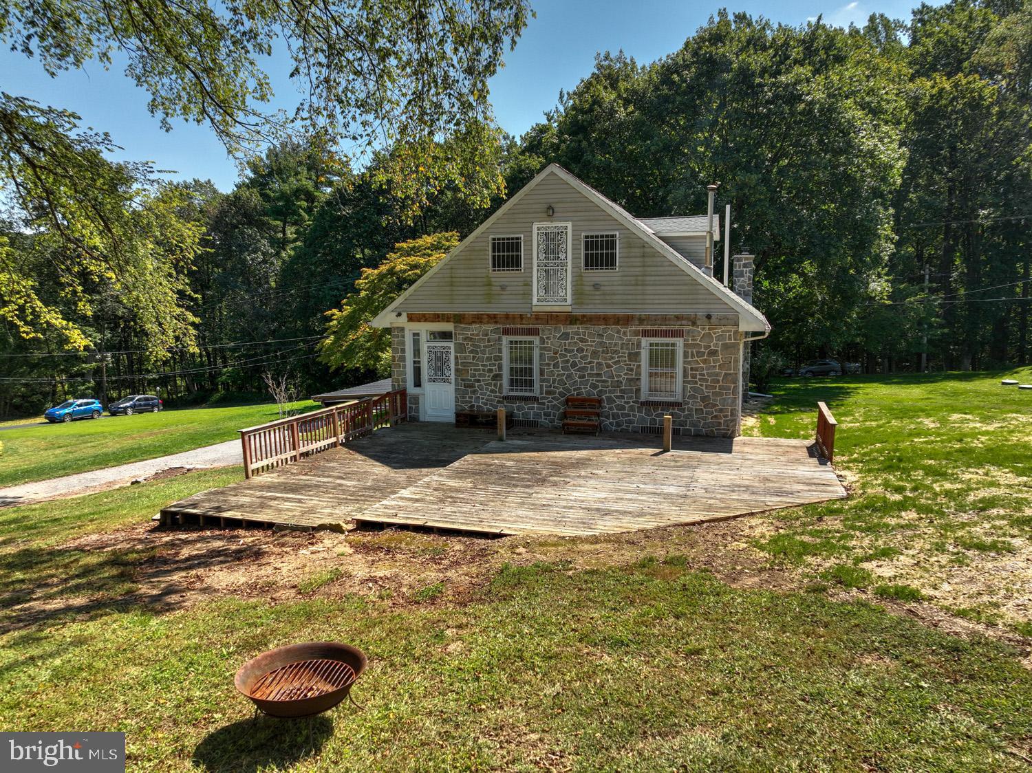 483 Angora Road Reading, PA 19606 - Photo 56 of 73 a house with trees in the background