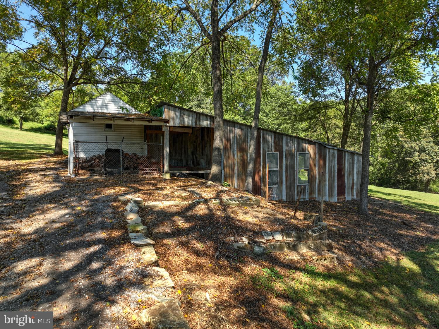 483 Angora Road Reading, PA 19606 - Photo 66 of 73 a backyard of a house with table and chairs