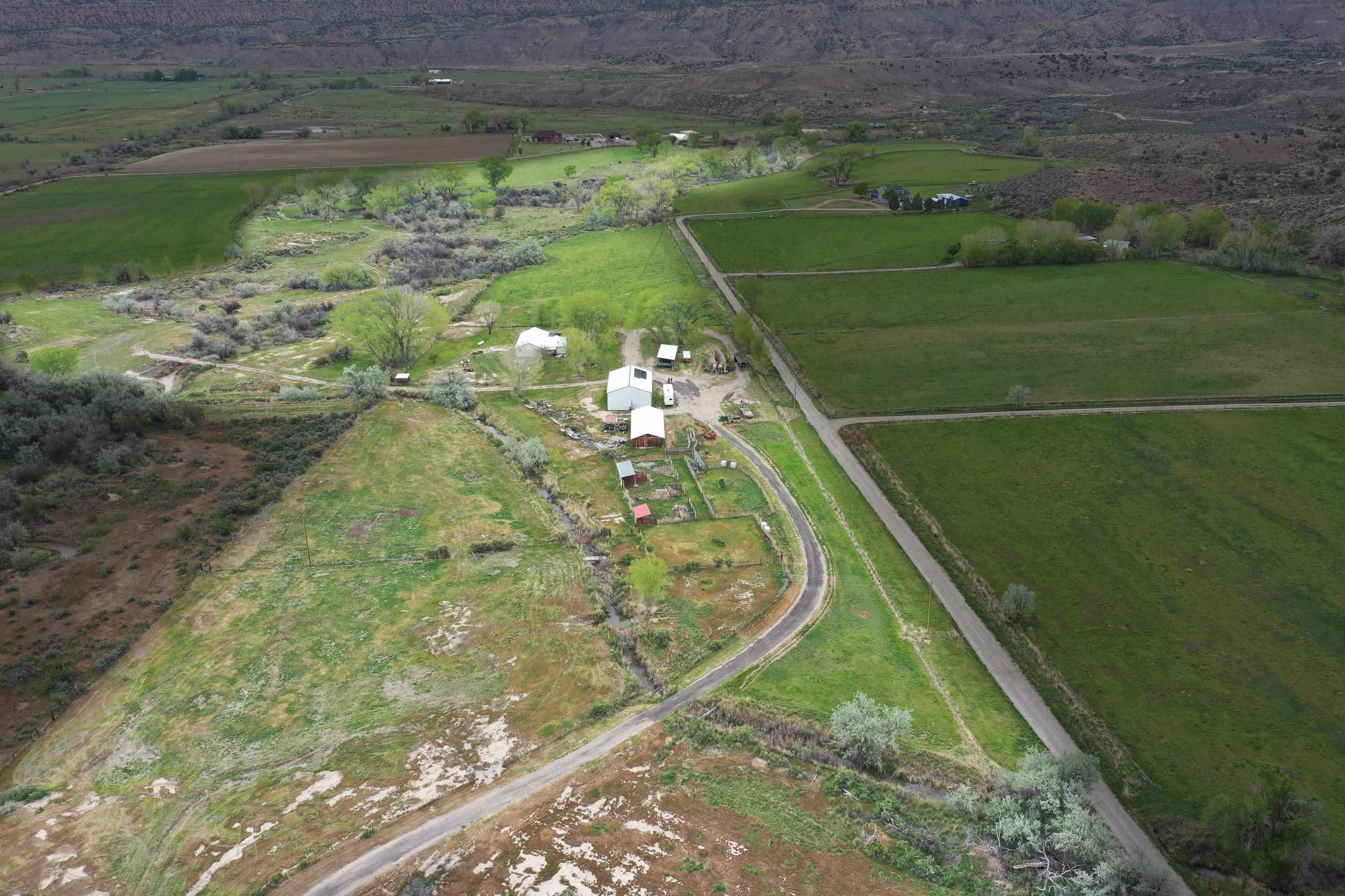 1951 I-70 B Frontage Road De Beque, CO 81630 - Photo 2 of 19 a view of a garden