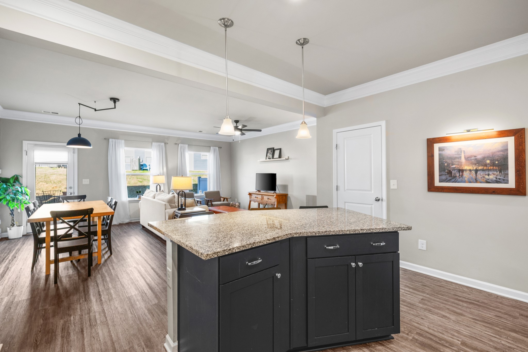 2806 Dixie Road Columbia, TN 38401 - Photo 11 of 28 a kitchen with granite countertop a sink stove and wooden floor