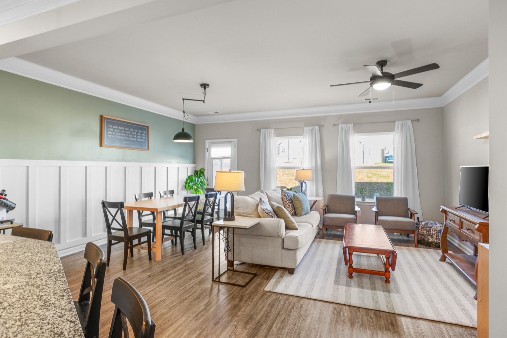 2806 Dixie Road Columbia, TN 38401 - Photo 12 of 28 a living room with furniture dining table and a flat screen tv