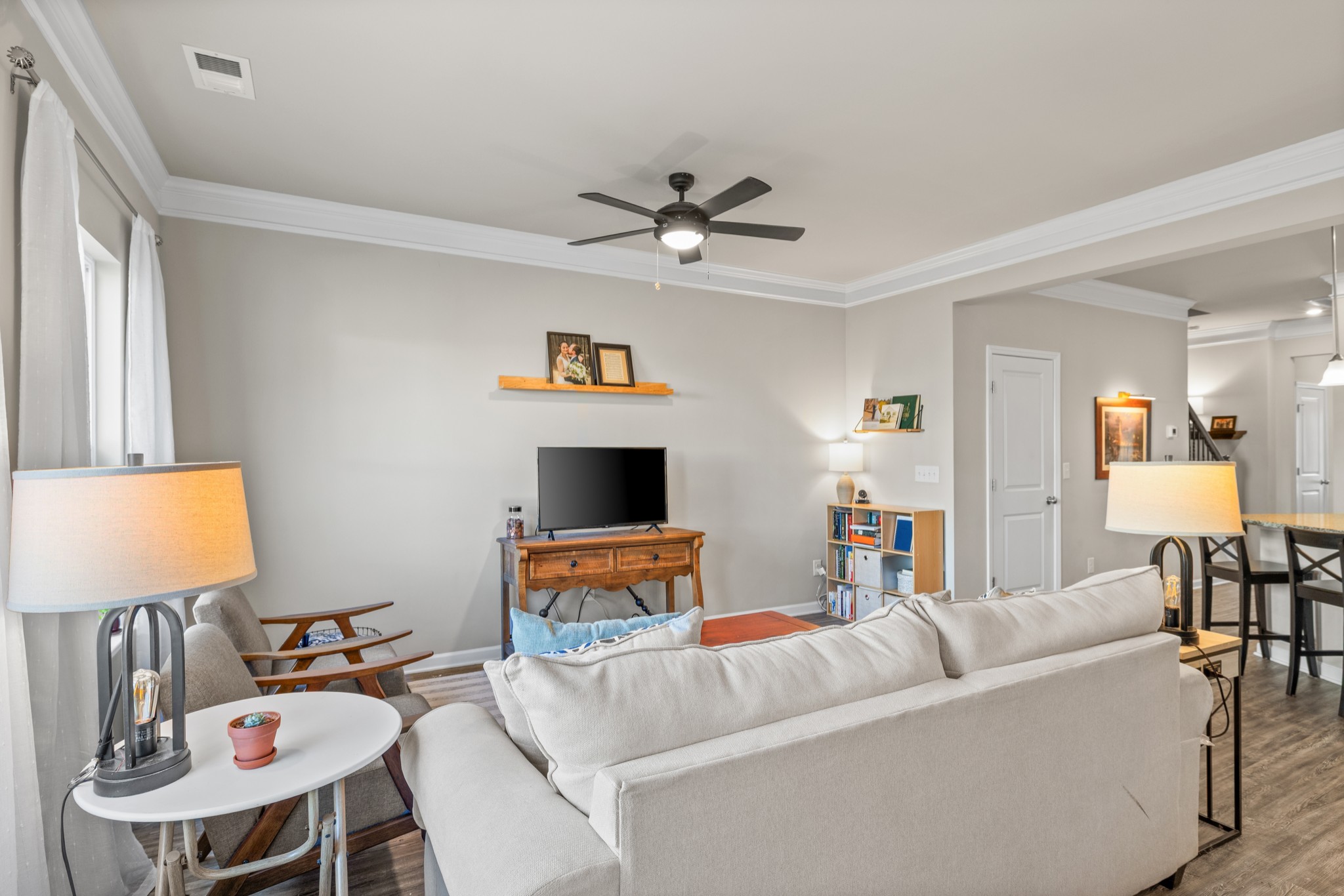 2806 Dixie Road Columbia, TN 38401 - Photo 14 of 28 a living room with furniture a fireplace and a flat screen tv