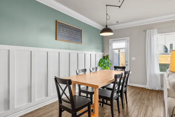 a room with furniture and a book shelf