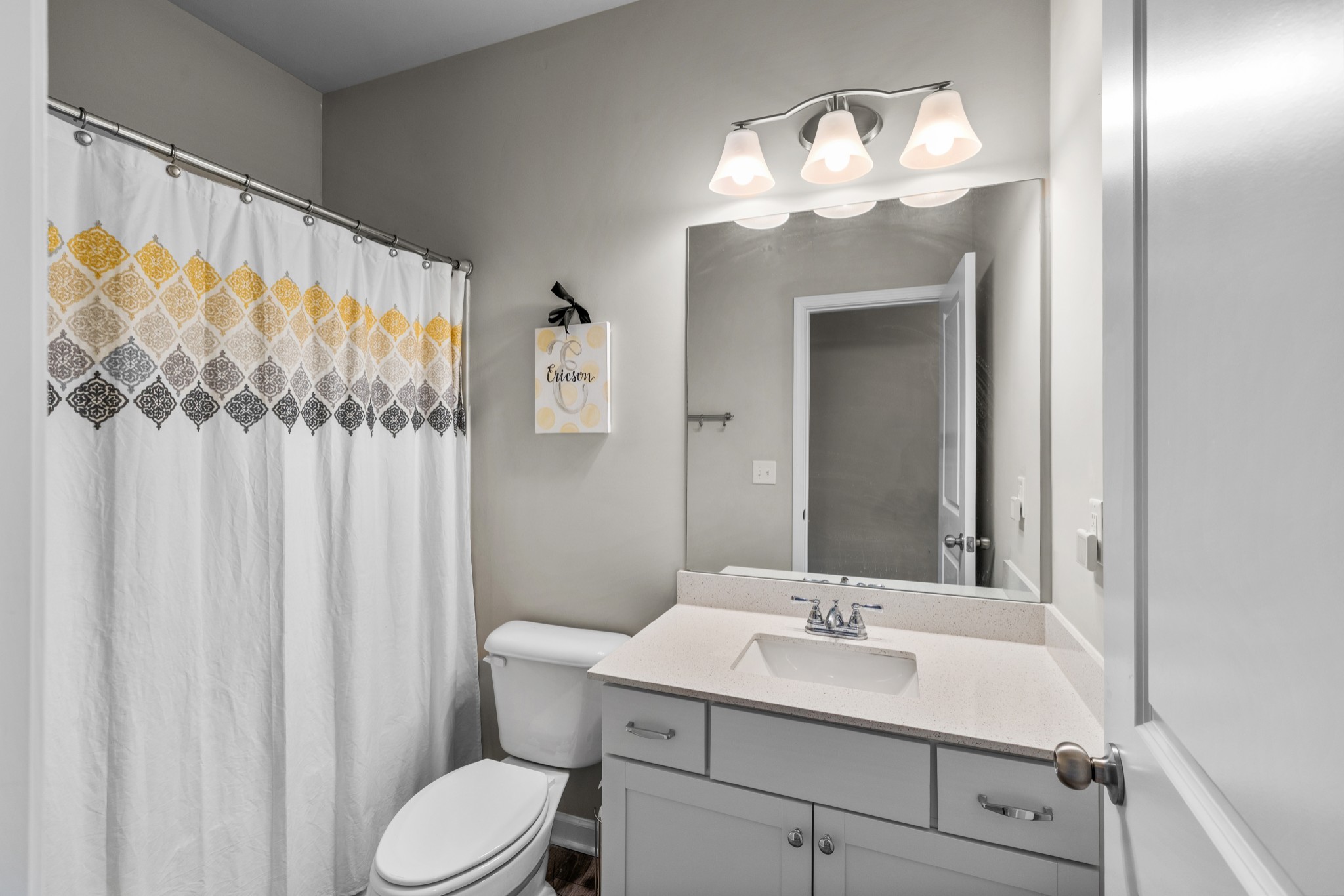 2806 Dixie Road Columbia, TN 38401 - Photo 21 of 28 a bathroom with a sink vanity mirror and toilet