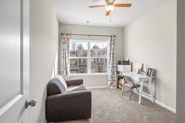 a living room with a couch and a coffee table