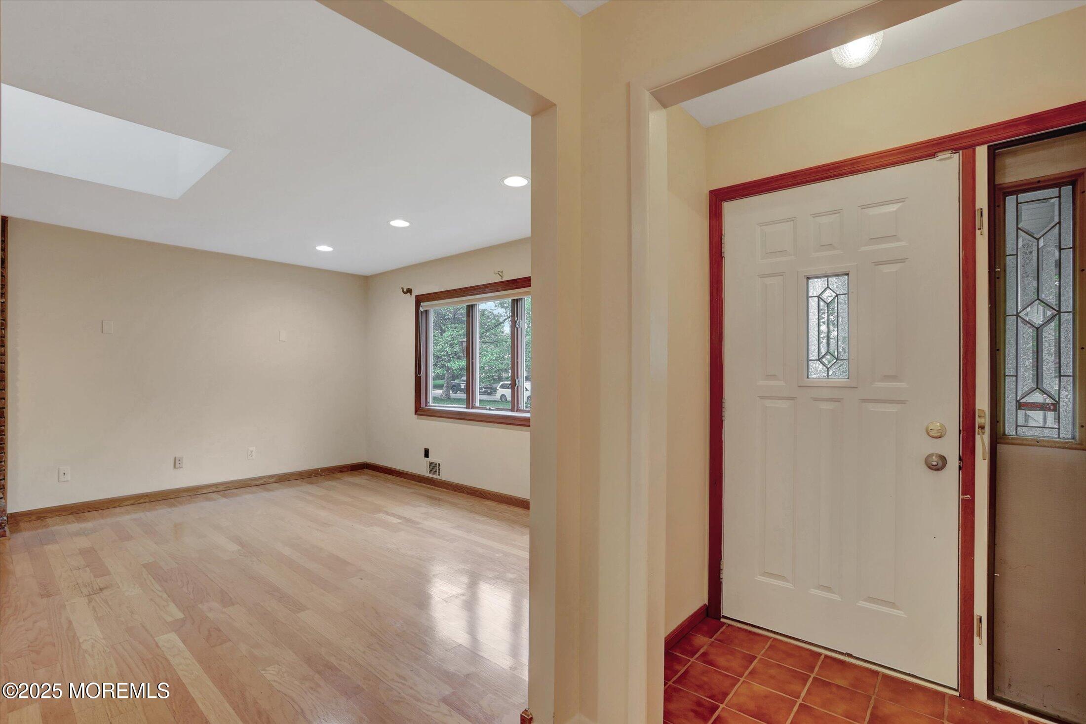 159 Koster Drive Freehold, NJ 07728 - Photo 17 of 37 a view of an empty room with a window
