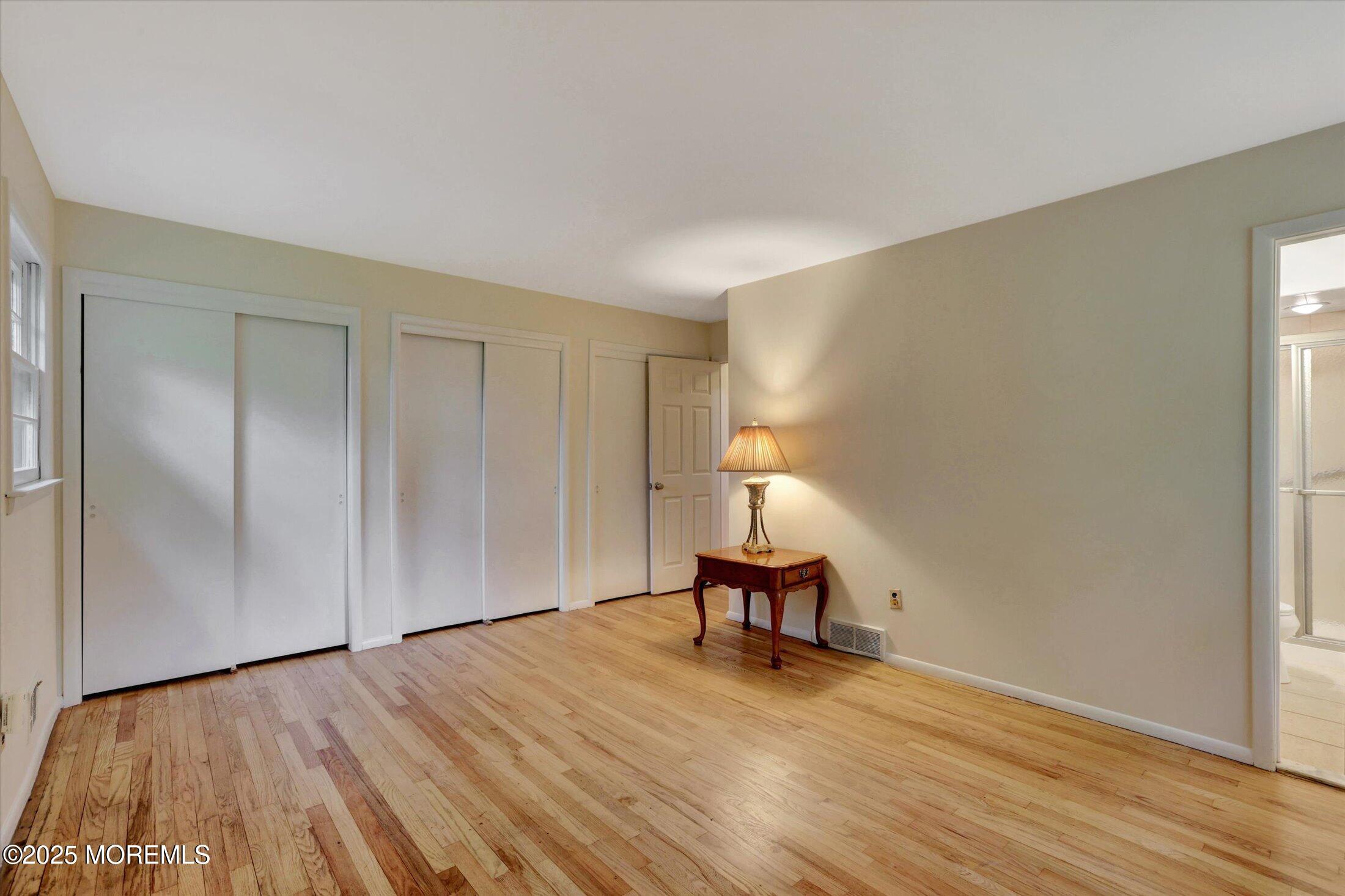 159 Koster Drive Freehold, NJ 07728 - Photo 25 of 37 a view of empty room with wooden floor