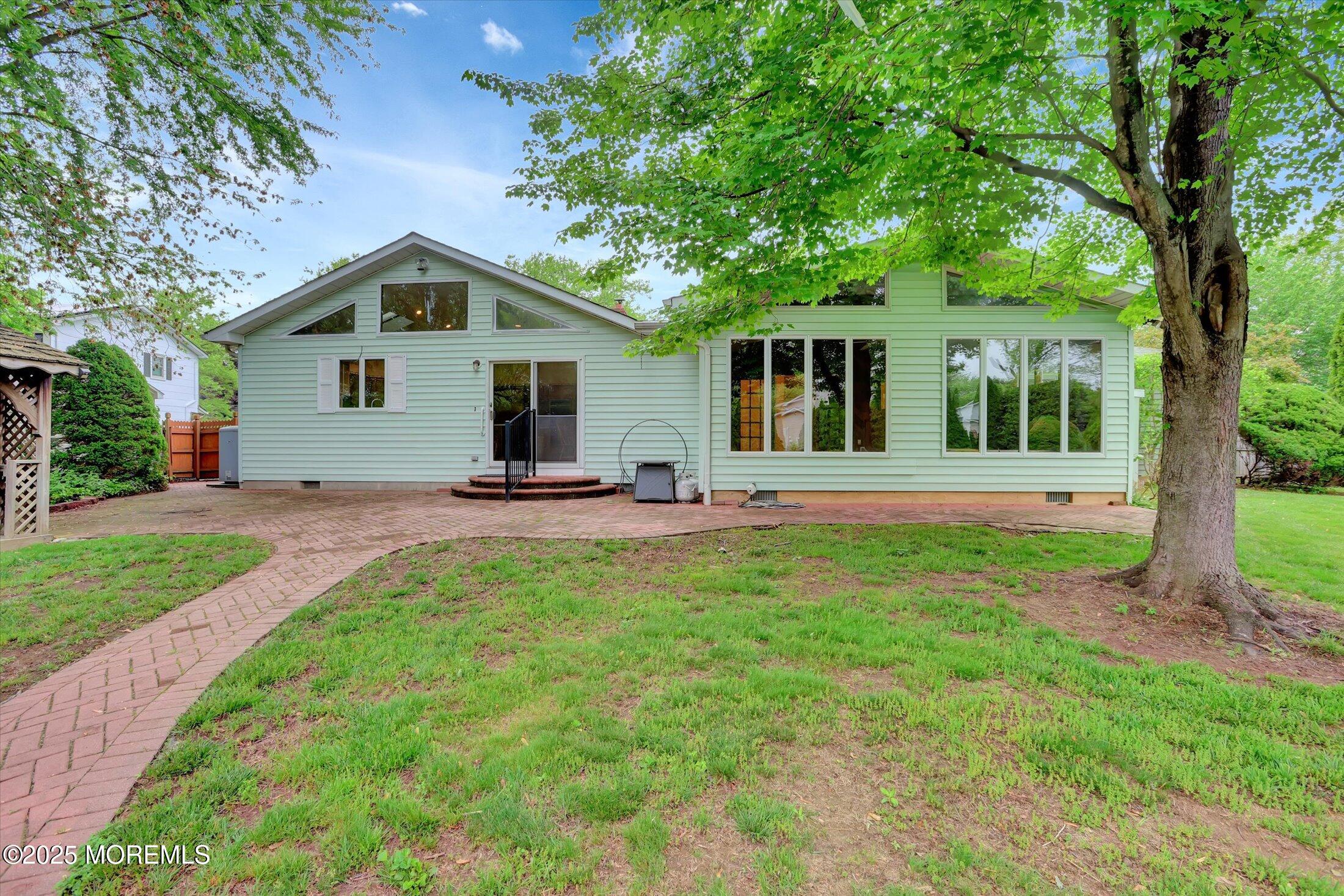 159 Koster Drive Freehold, NJ 07728 - Photo 33 of 37 a front view of a house with a yard