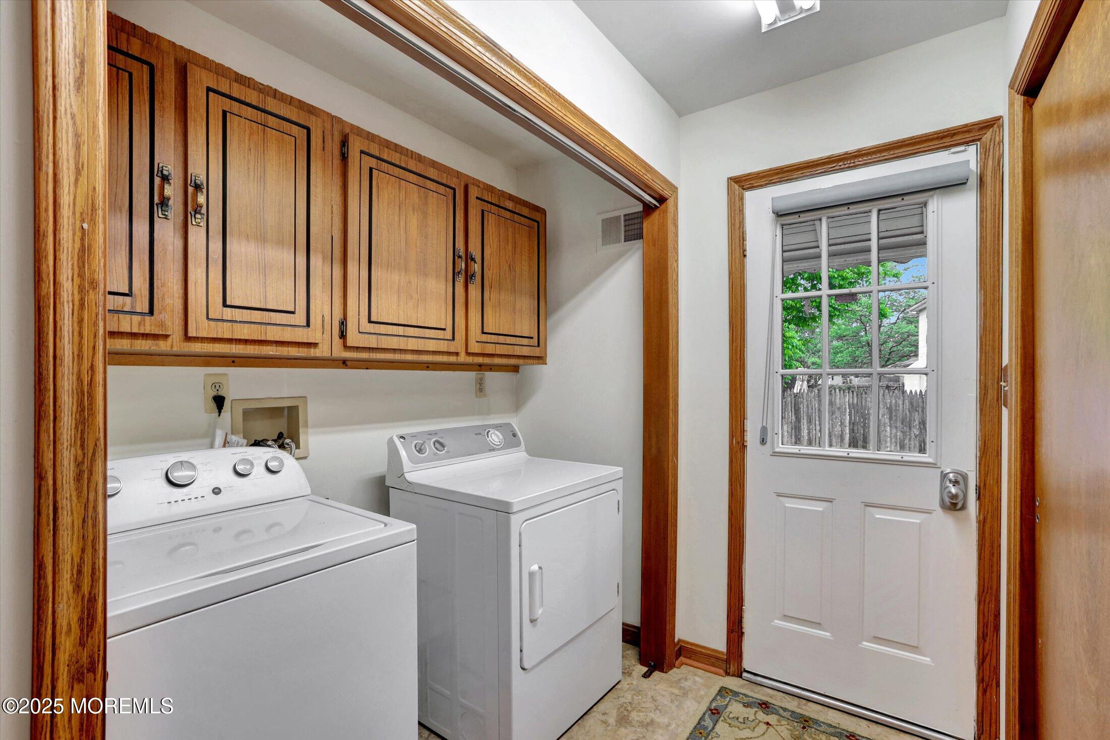 159 Koster Drive Freehold, NJ 07728 - Photo 7 of 37 a utility room with dryer and washer