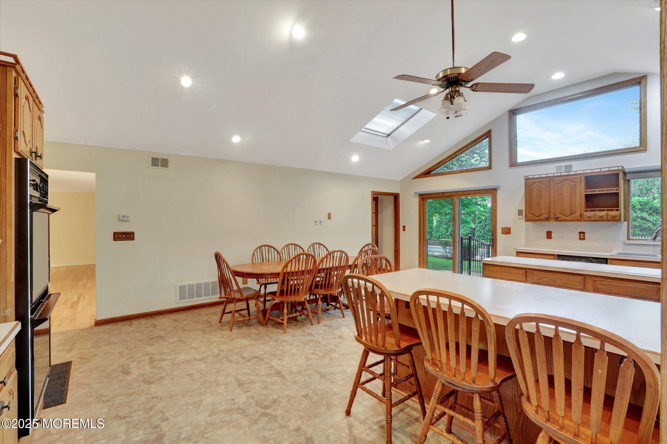 159 Koster Drive Freehold, NJ 07728 - Photo 8 of 37 a view of a dining room with furniture window and outside view