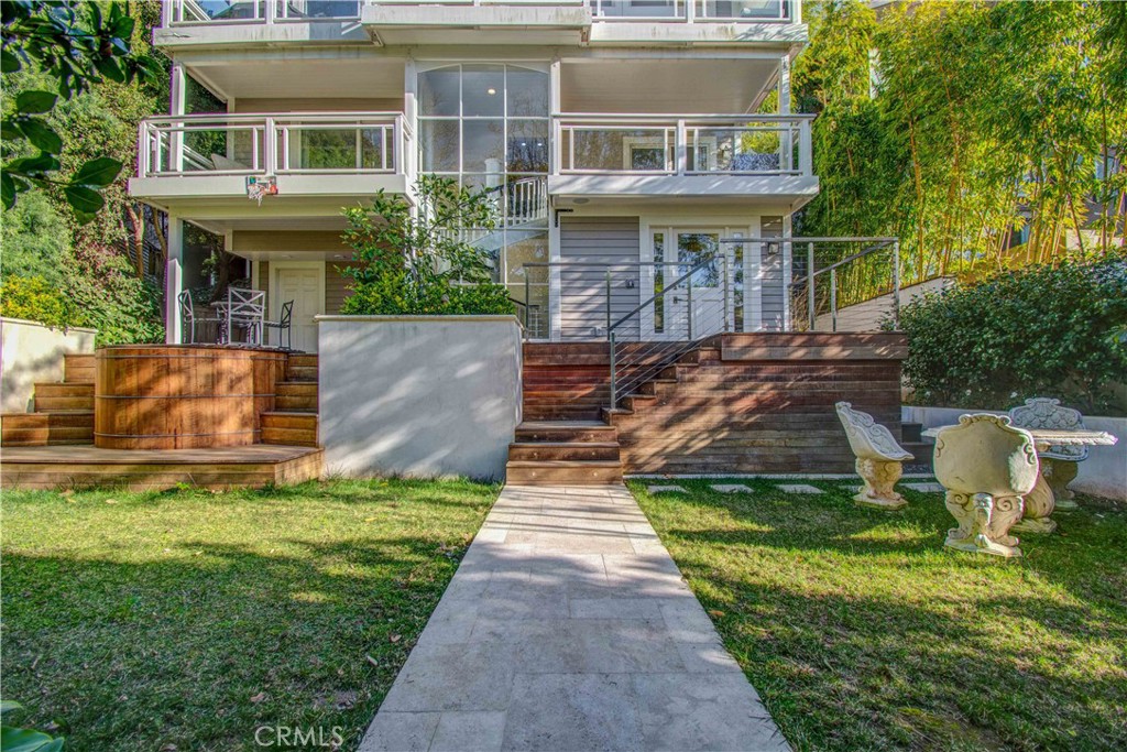 255 Emerald Bay Laguna Beach, CA 92651 - Photo 22 of 27 a front view of a house with garden