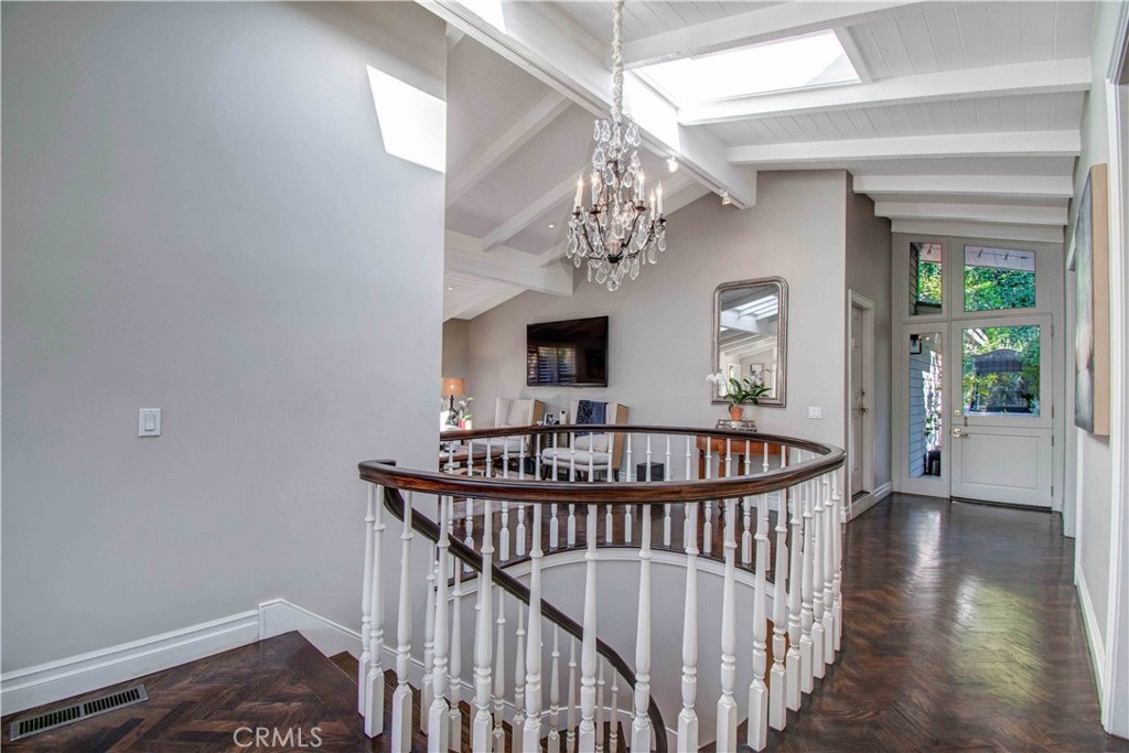 255 Emerald Bay Laguna Beach, CA 92651 - Photo 6 of 27 a view of a balcony with an entryway and wooden floor