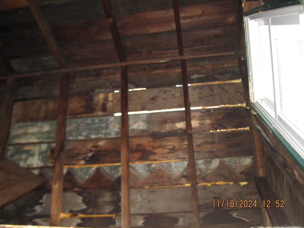 46-48 Wait Street Springfield, MA 01104 - Photo 14 of 19 a bathroom with a glass shower door