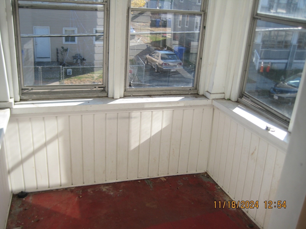 46-48 Wait Street Springfield, MA 01104 - Photo 19 of 19 a view of an empty room with a window