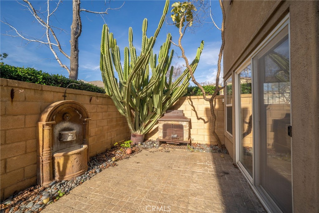 7331 Shelby Place, Unit 102 Rancho Cucamonga, CA 91739 - Photo 29 of 44 a view of a entryway door of the house