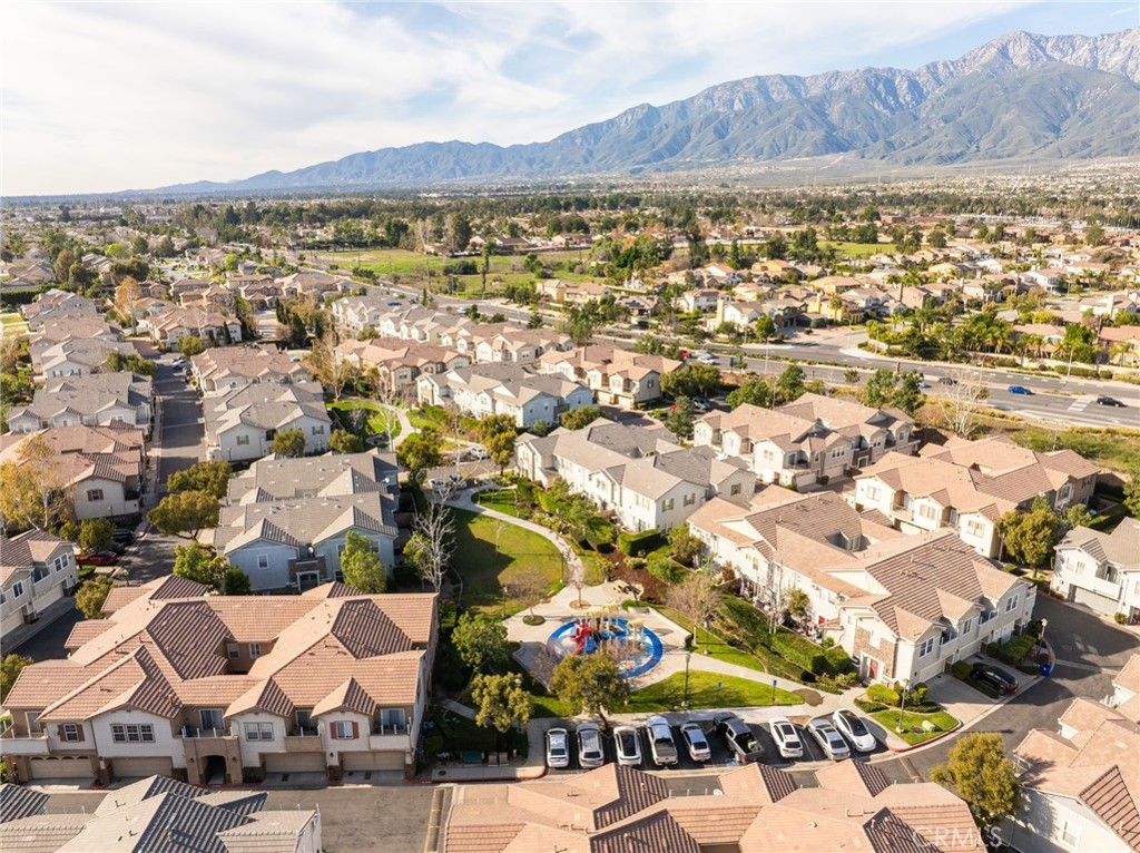 7331 Shelby Place, Unit 102 Rancho Cucamonga, CA 91739 - Photo 40 of 44 an aerial view of residential houses with outdoor space and pool