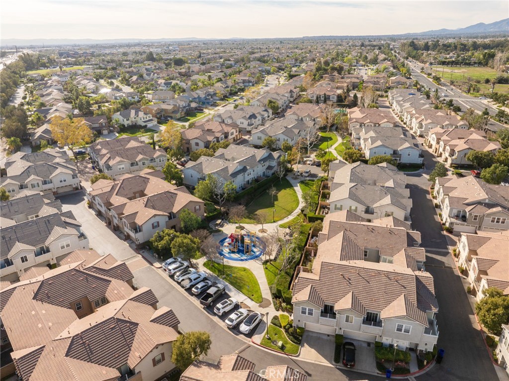 7331 Shelby Place, Unit 102 Rancho Cucamonga, CA 91739 - Photo 41 of 44 an aerial view of residential houses with outdoor space