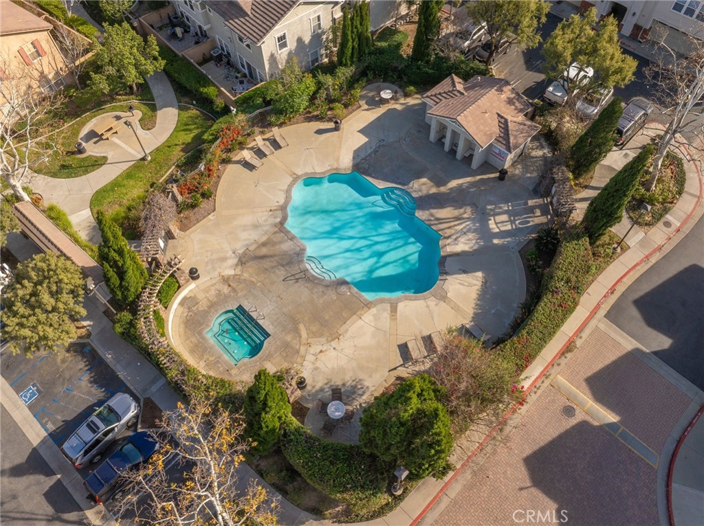 7331 Shelby Place, Unit 102 Rancho Cucamonga, CA 91739 - Photo 42 of 44 an aerial view of a house with a swimming pool