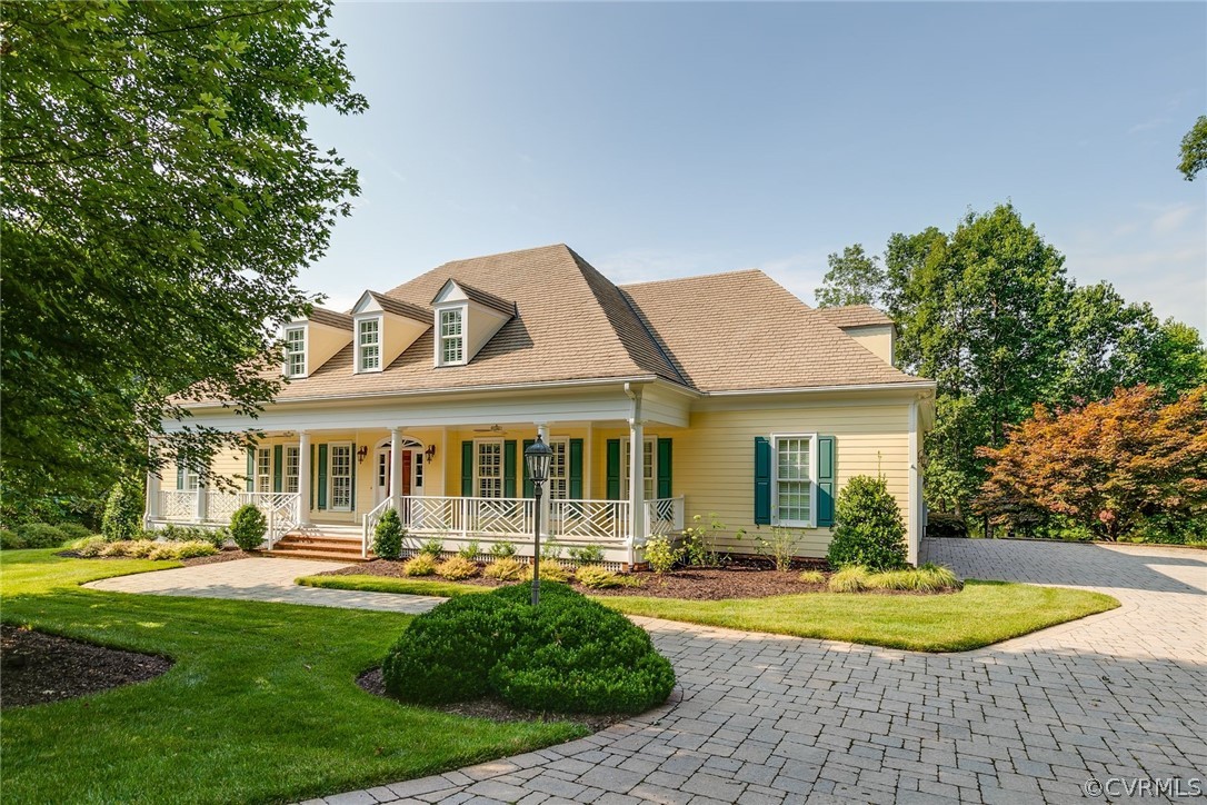 200 Kinloch Road Manakin-Sabot, VA 23103 - Photo 1 of 32 a front view of a house with swimming pool having outdoor seating
