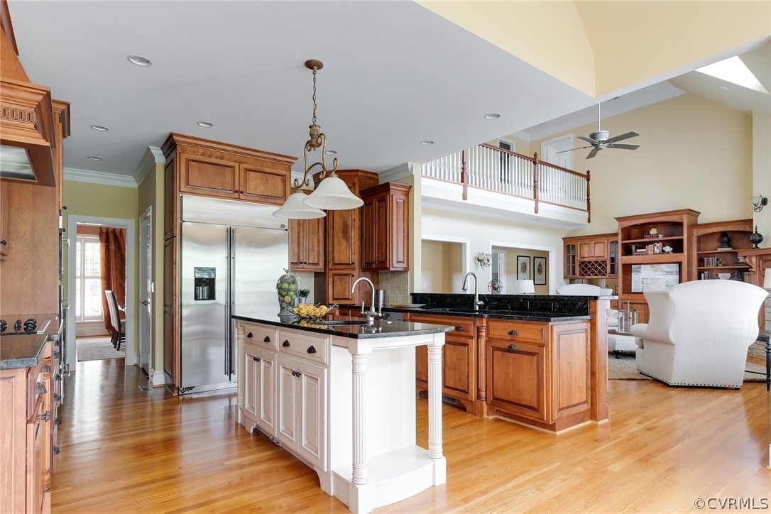 200 Kinloch Road Manakin-Sabot, VA 23103 - Photo 13 of 32 a kitchen with stainless steel appliances kitchen island granite countertop a stove a sink and a refrigerator